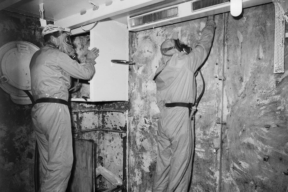 Asbestos removal on board ship in 1986.